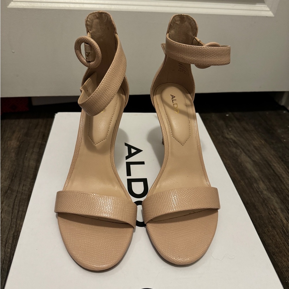 Pale pink strapped heels